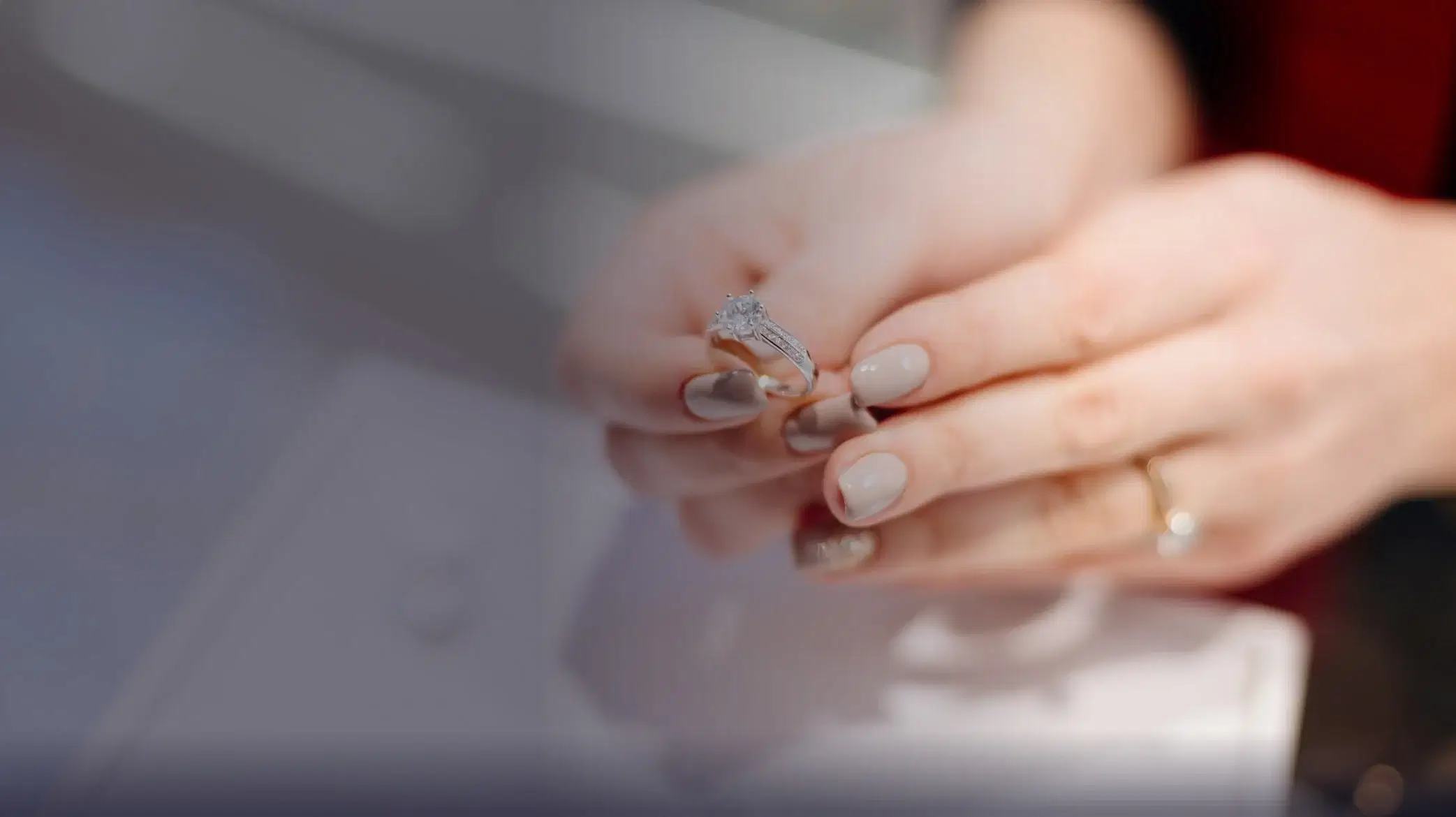 Holding Engagement Ring